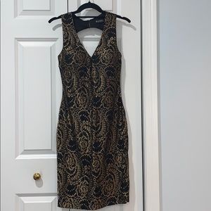Gorgeous black and gold open back dress